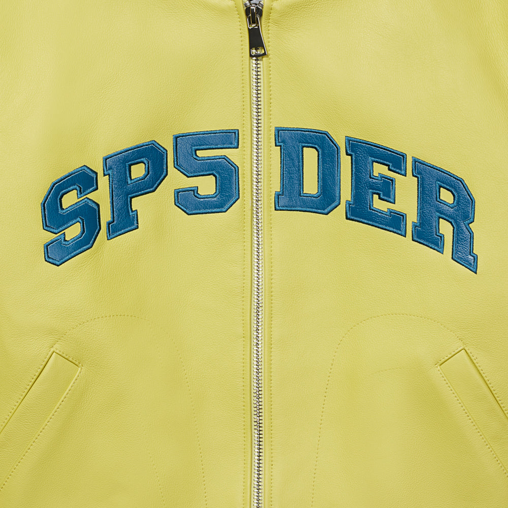 Yellow cowskin leather bomber jacket with "SP5DER" logo patches, zip closure, and welt pockets.