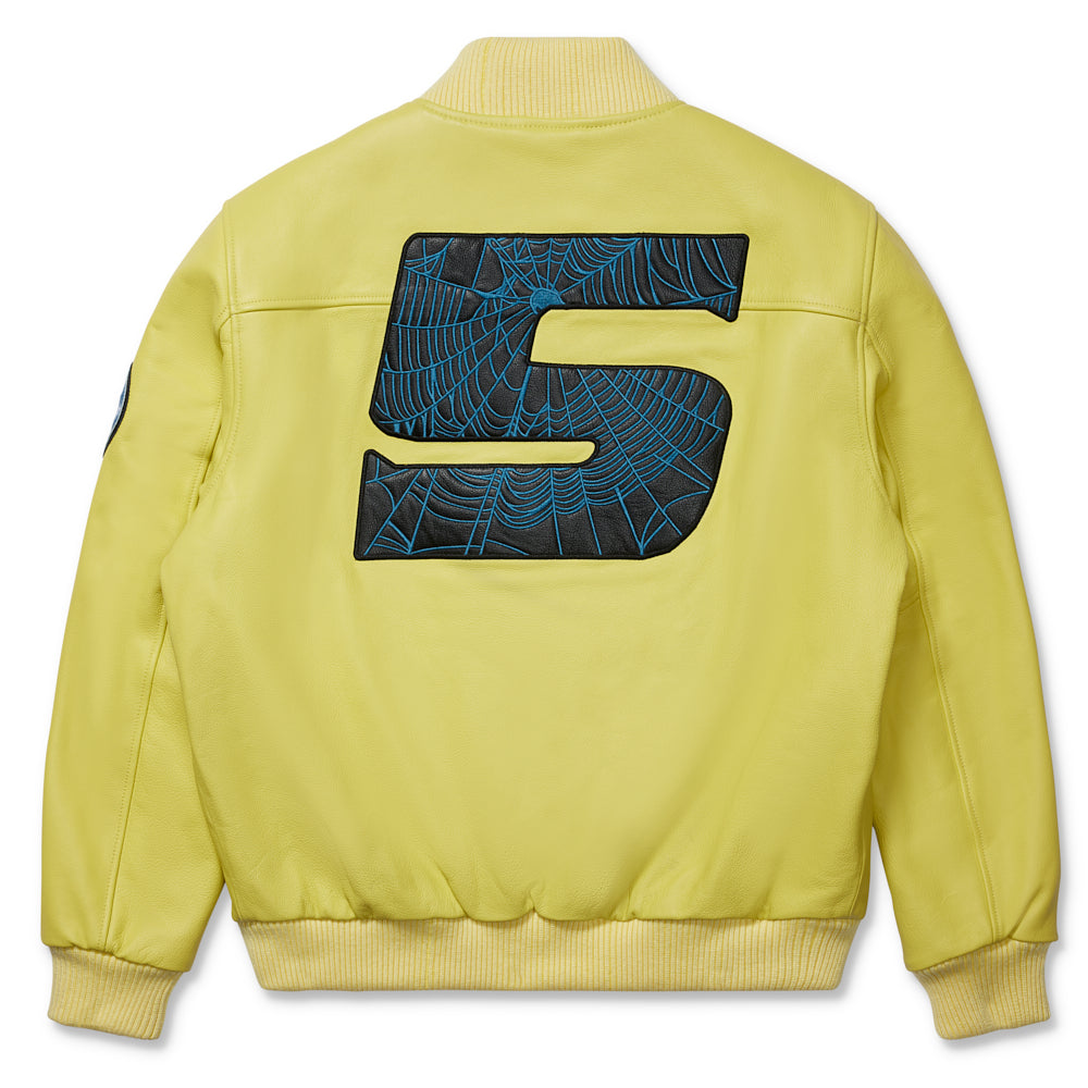 Yellow leather bomber jacket with large black "5" patch featuring blue spiderweb design on the back.
