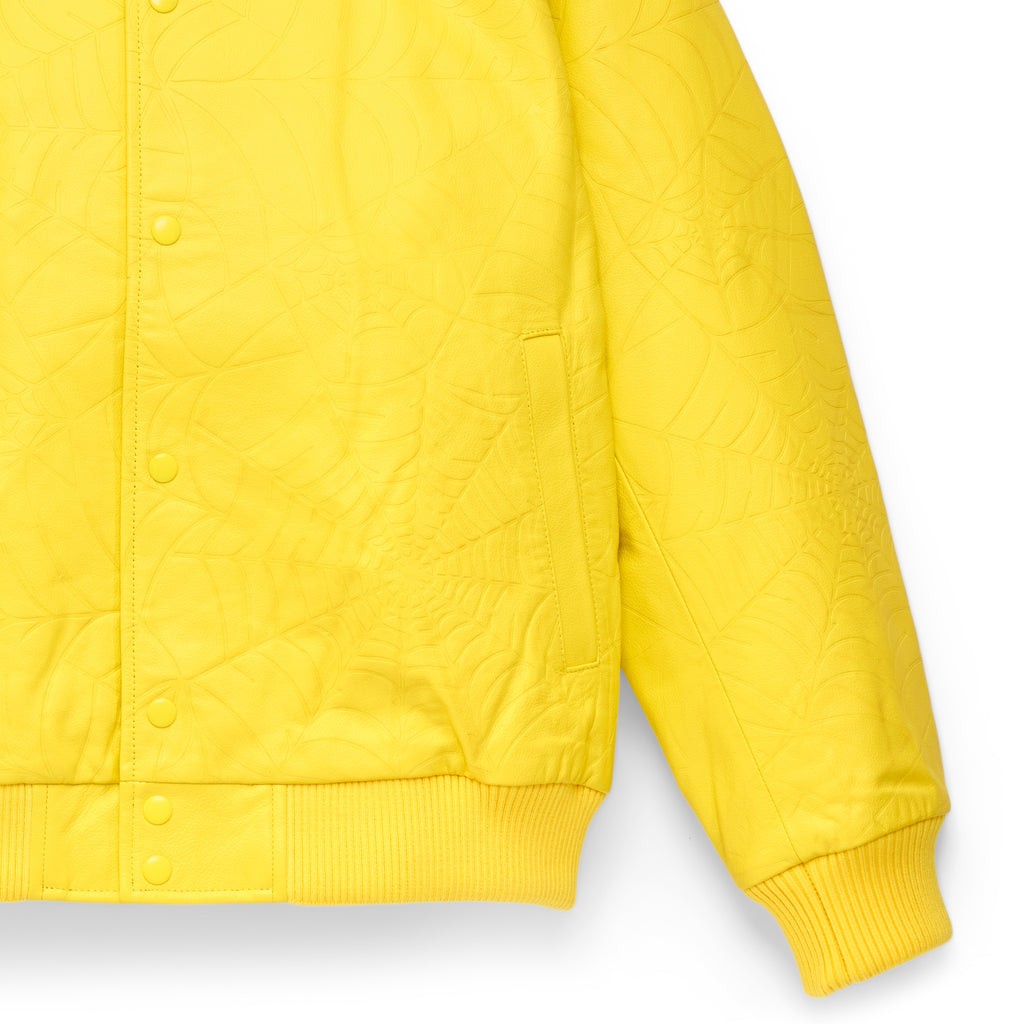Yellow cowskin leather jacket with debossed web design, press-stud closure, and ribbed elasticated waist and cuffs.