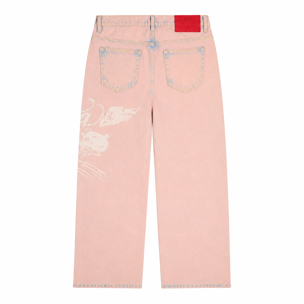 Pink straight-leg denim jeans featuring a white graphic print on the leg and a red branded leather back patch.