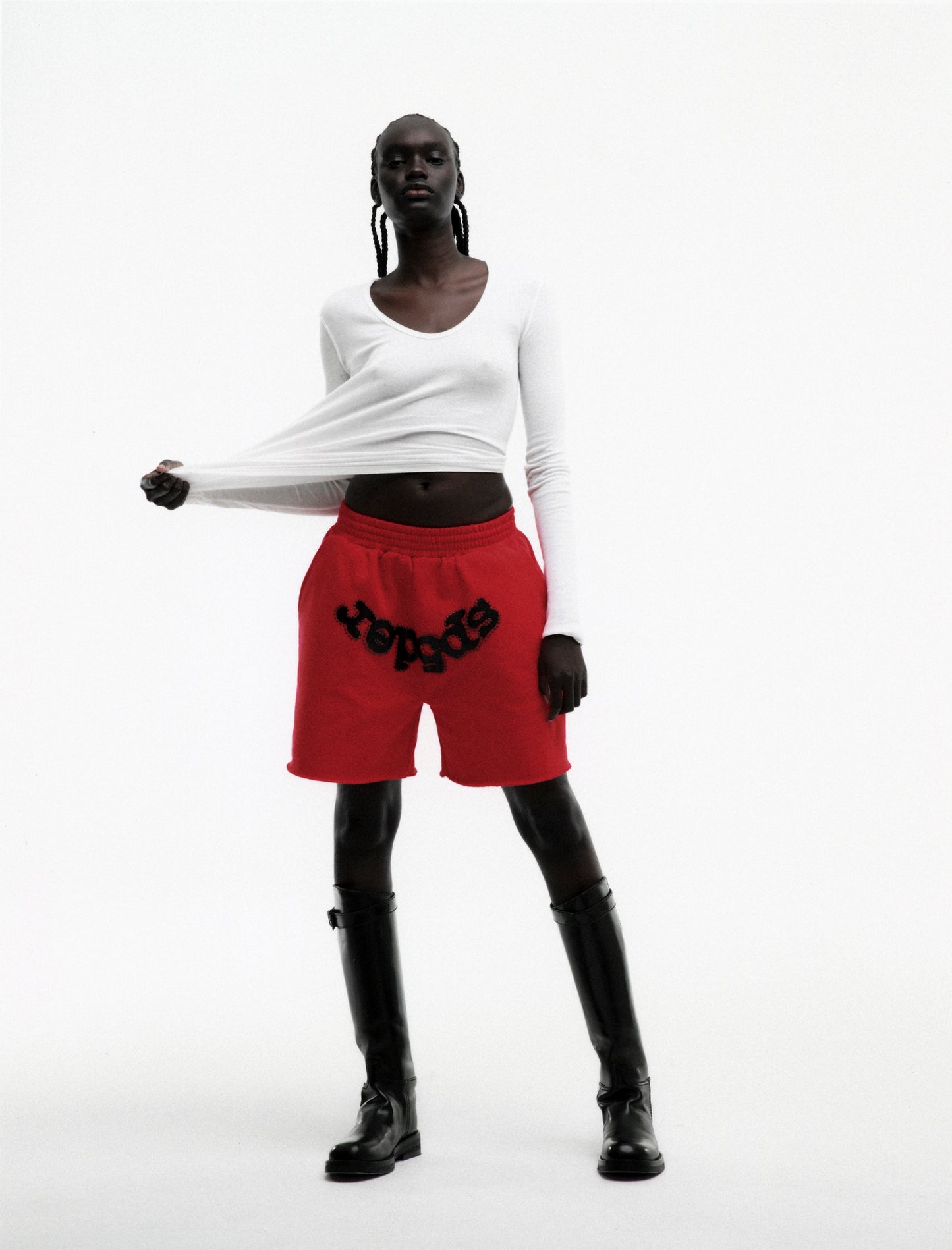 RED OG STUDDED SWEATSHORT ON MODEL