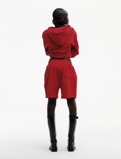 RED OG WEB STUDDED ZIP HOODIE ON MODEL