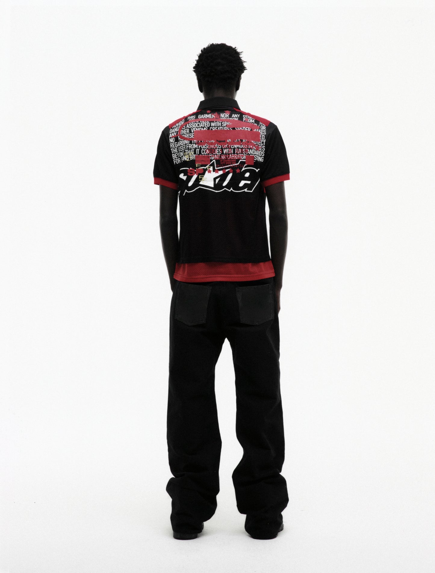 BLACK RECRUIT SS POLO ON MODEL