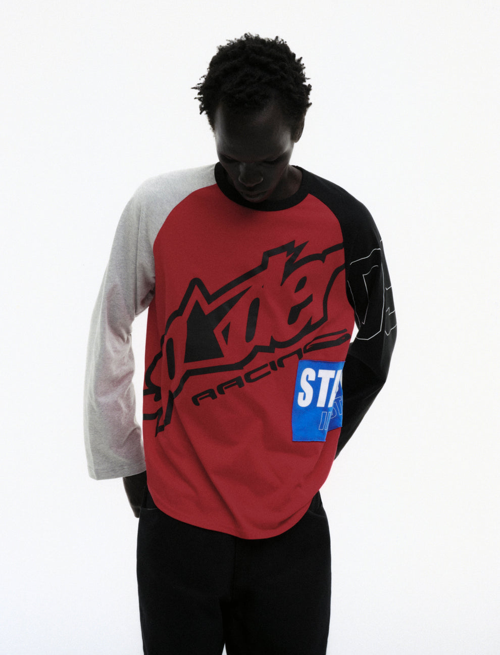 RED RALLY RAGLAN LONGSLEEVE ON MODEL