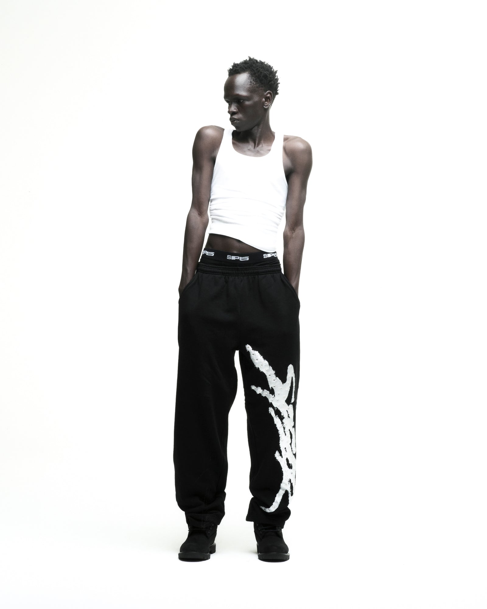 Black SCREAMING EAGLE SWEATPANT, 100% cotton fleece, with rhinestone SP5DER logo and sprayed side stripe.