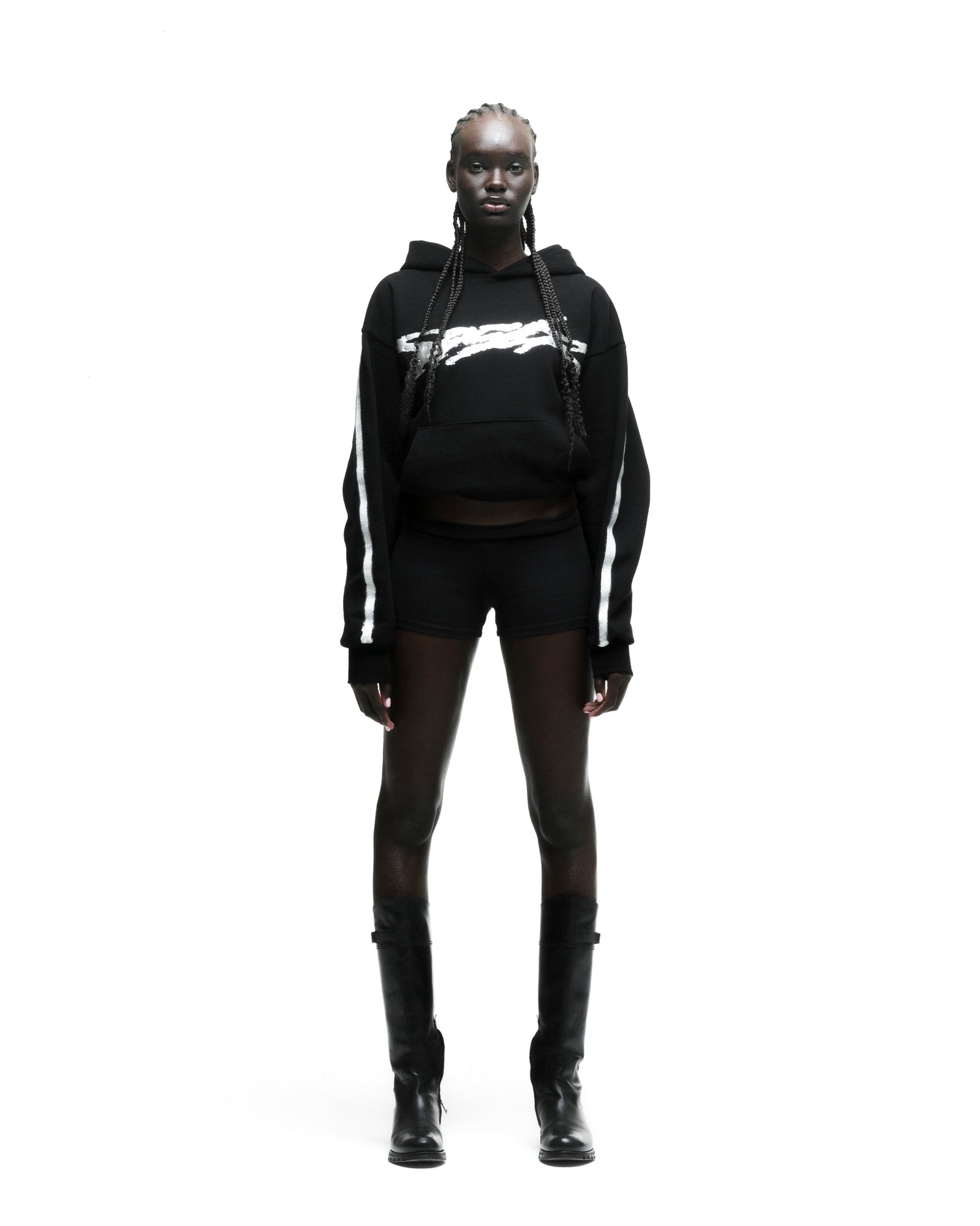 Black cotton fleece hoodie with metallic graphic, rhinestone SP5DER logo, and sprayed-effect stripes.