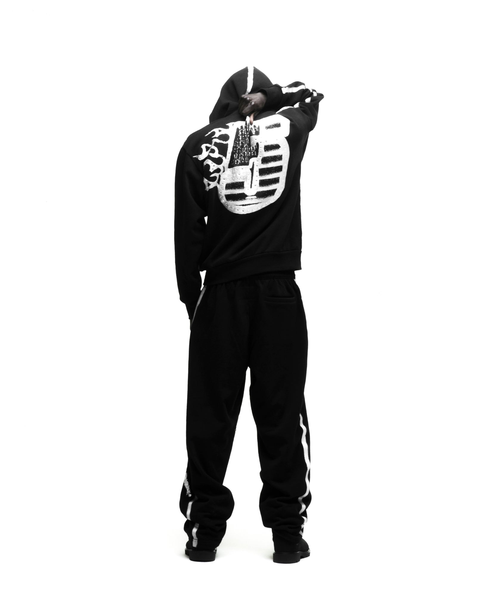 Black SCREAMING EAGLE HOODIE with flaming "5" graphic, rhinestone accents, and sprayed stripes.