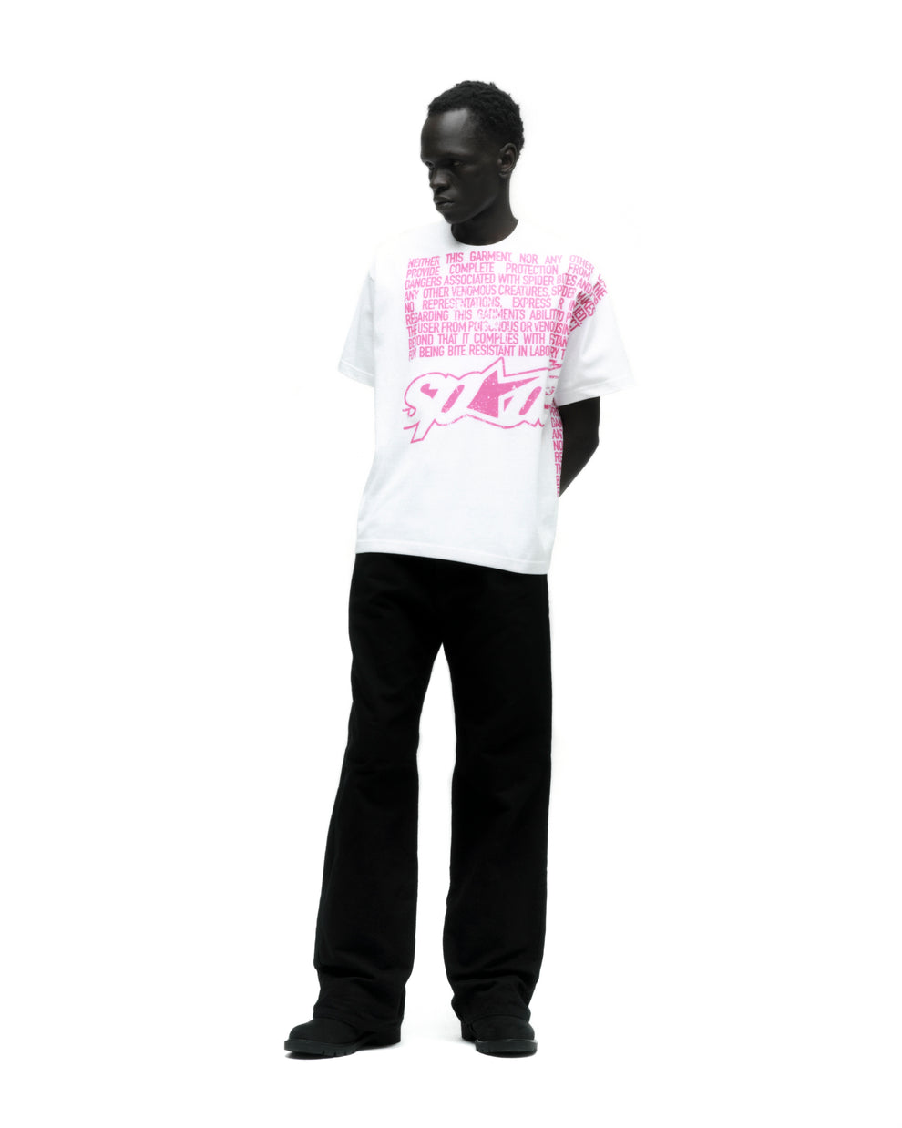 DISCLAIMER TEE ON MODEL