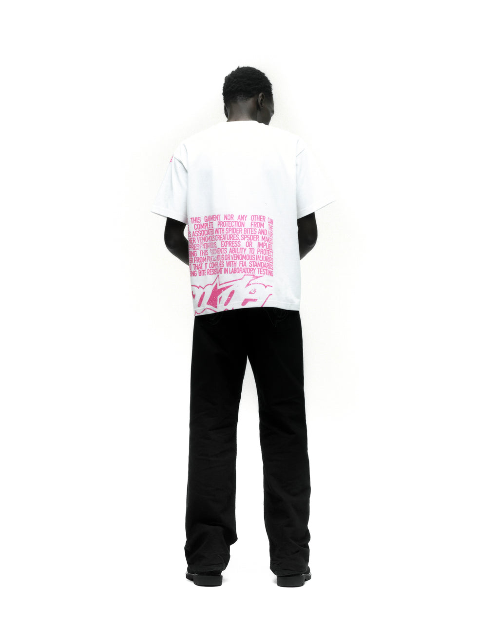 DISCLAIMER TEE ON MODEL