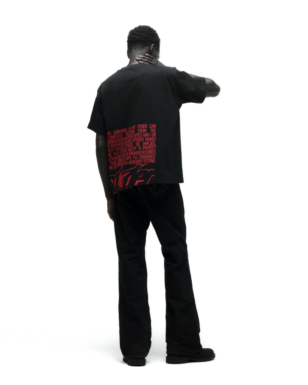 DISCLAIMER TEE ON MODEL