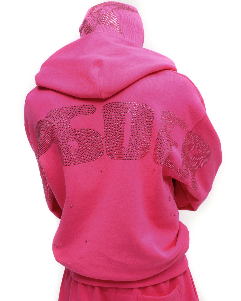 Pink 100% cotton fleece hoodie with rhinestone design on back and hood.