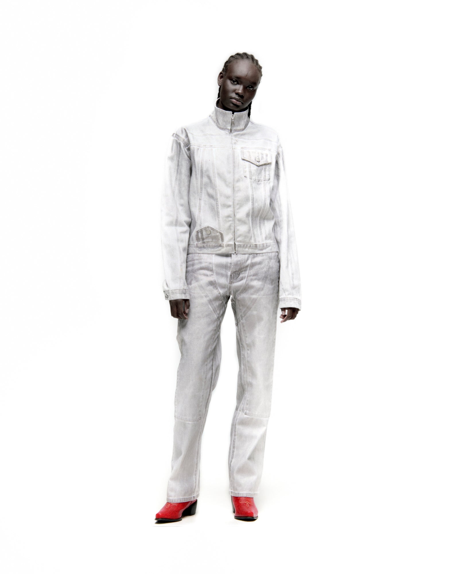 Platinum Trucker Jacket: Spray-effect white denim jacket and matching jeans with contrast seams, zip closure, and pockets.
