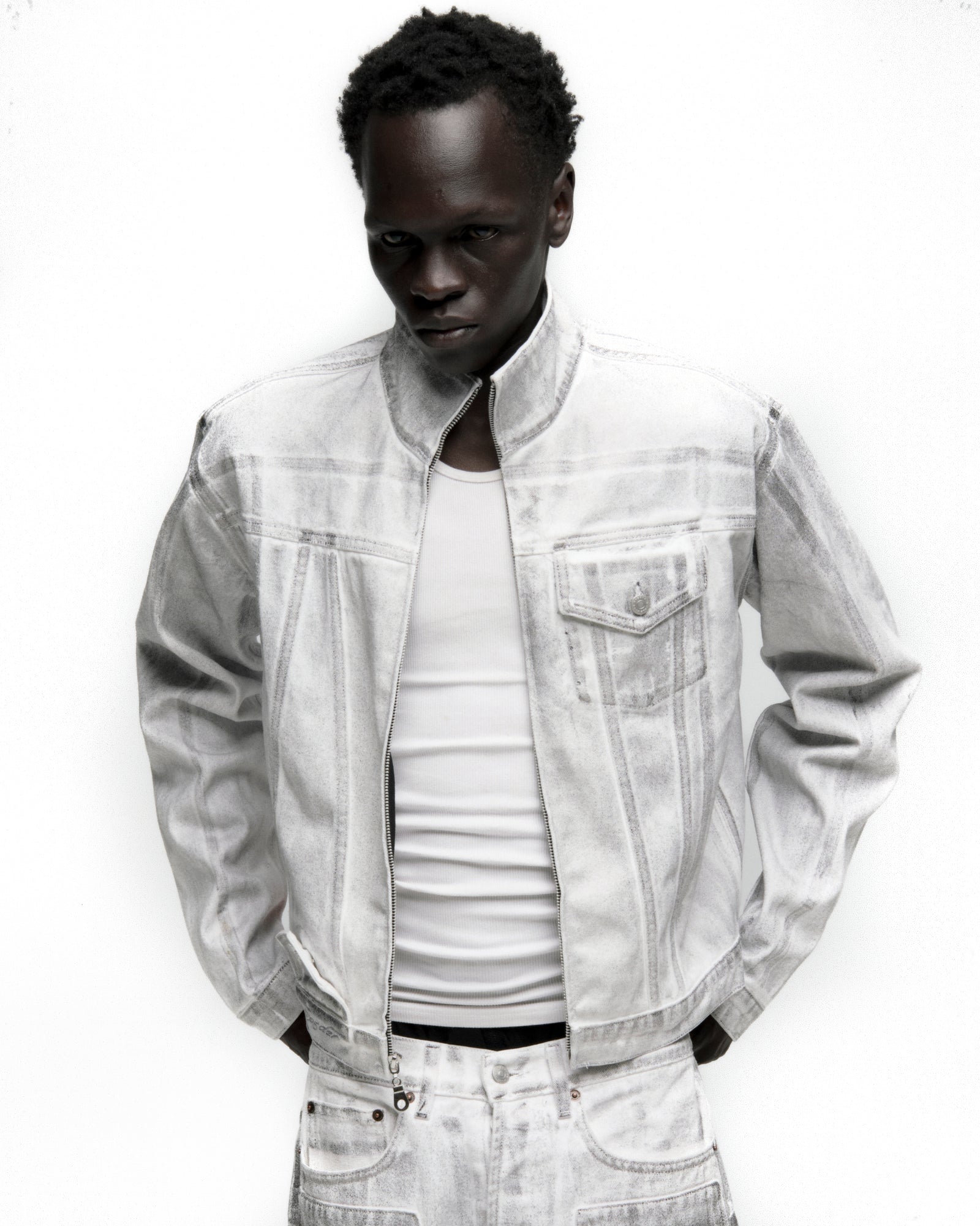 Platinum Trucker Jacket: Spray-effect white denim, zip-up, chest pocket, contrast seams.