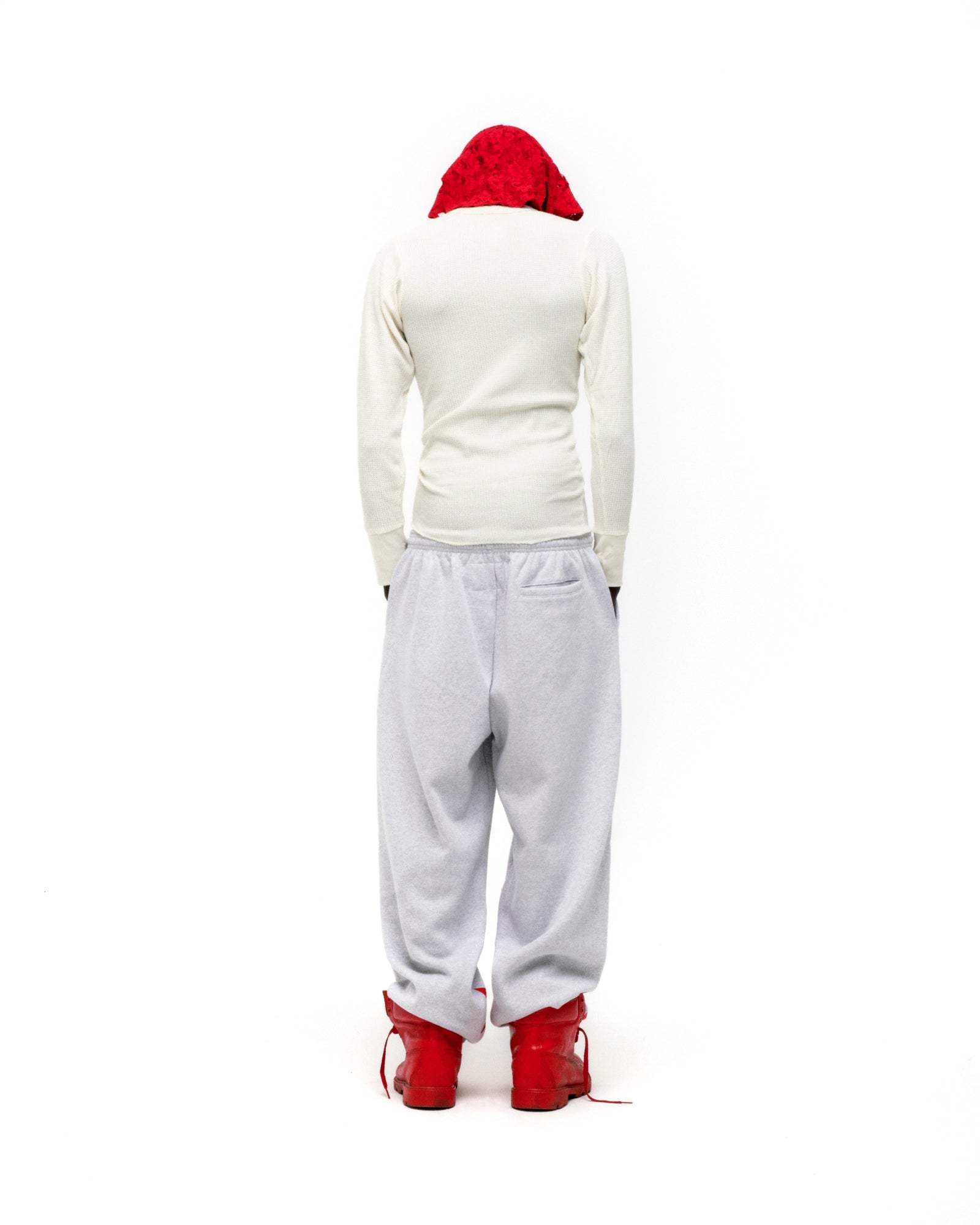 Light grey wide-leg MX555 sweatpants with drawstring waistband and three-pocket styling.
