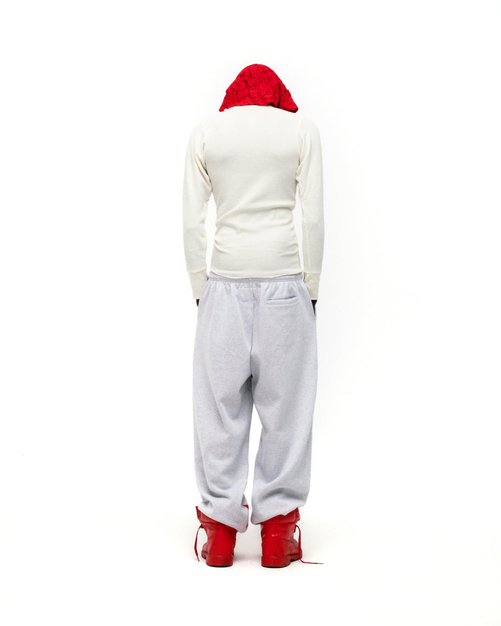 Light grey wide-leg MX555 sweatpants with drawstring waistband and three-pocket styling.