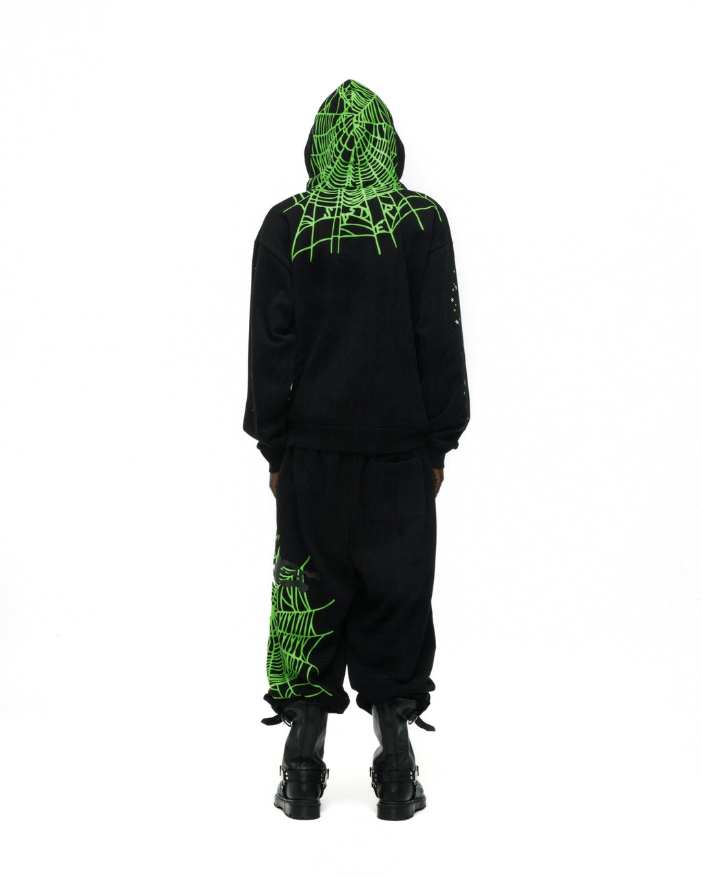 Black cotton fleece hoodie with neon green web print on hood and shoulders, matching sweatpants.
