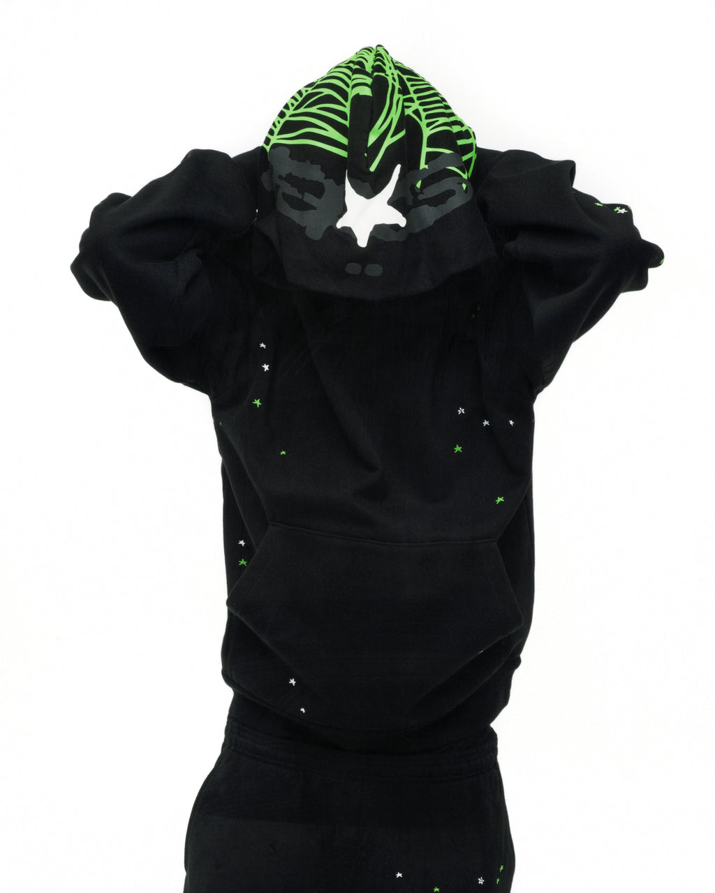 Black 13oz cotton fleece hoodie with green web print hood, scattered stars, and kangaroo pocket.