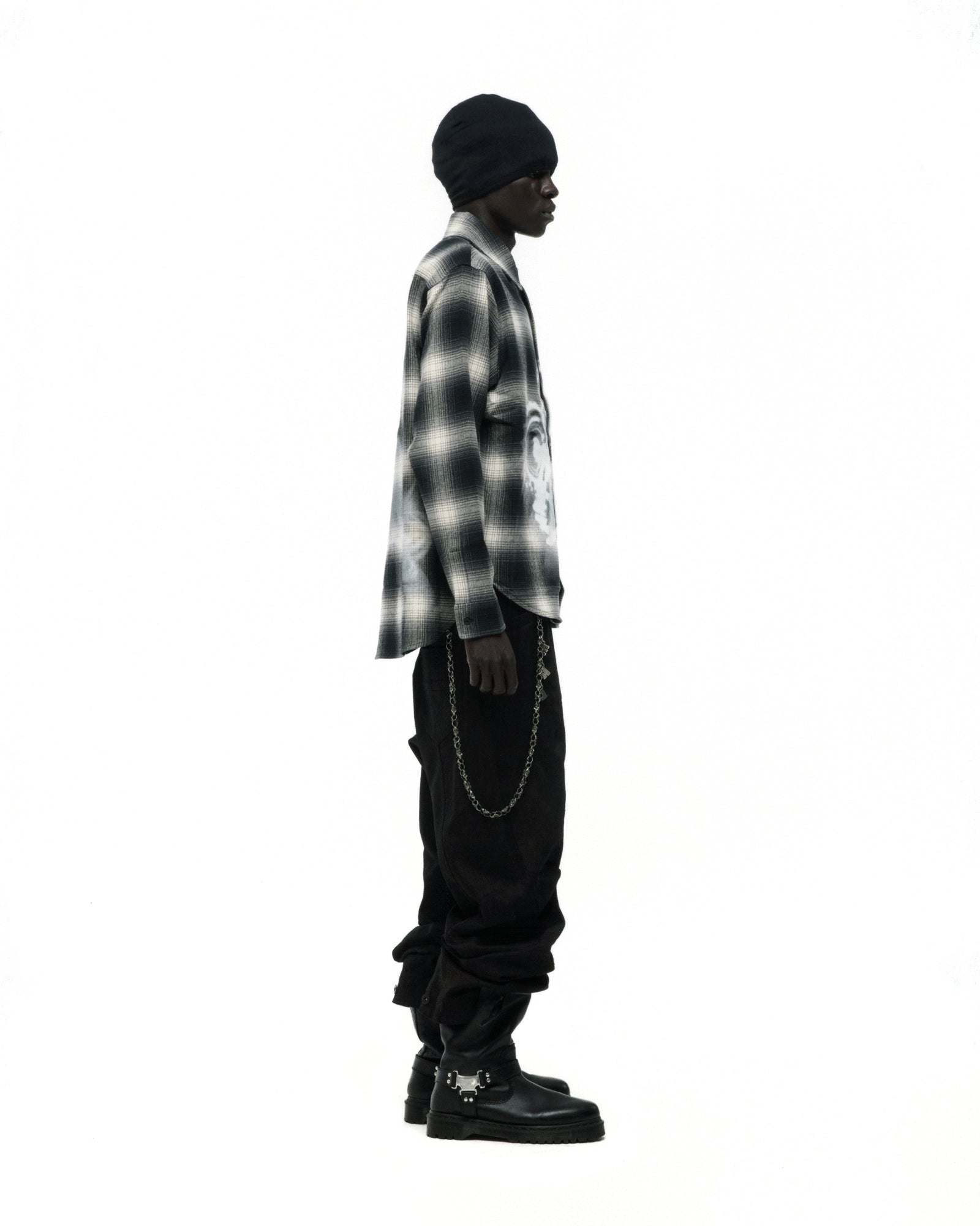 BURNOUT FLANNEL: Black and white cotton flannel shirt with faded graphic print, spread collar, and button closure.