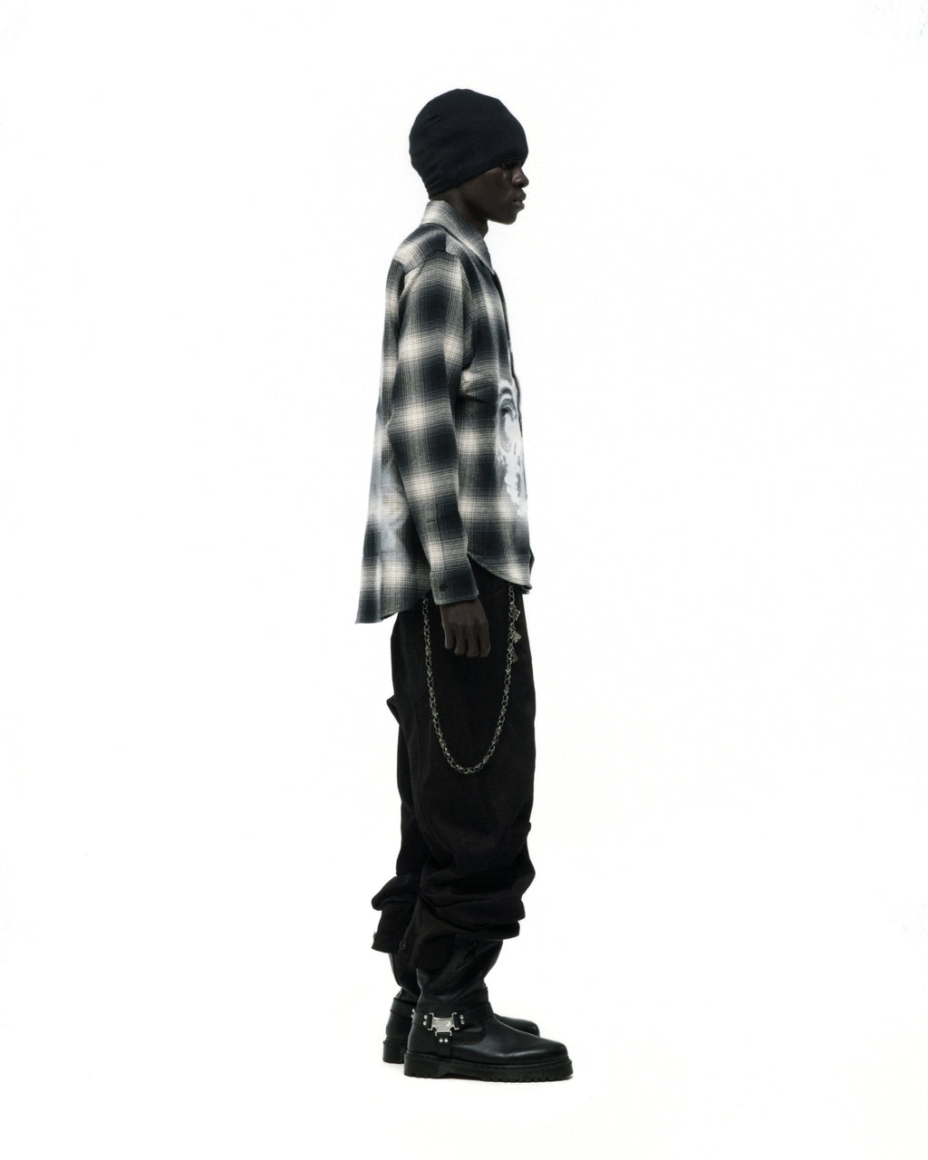 BURNOUT FLANNEL: Black and white cotton flannel shirt with faded graphic print, spread collar, and button closure.