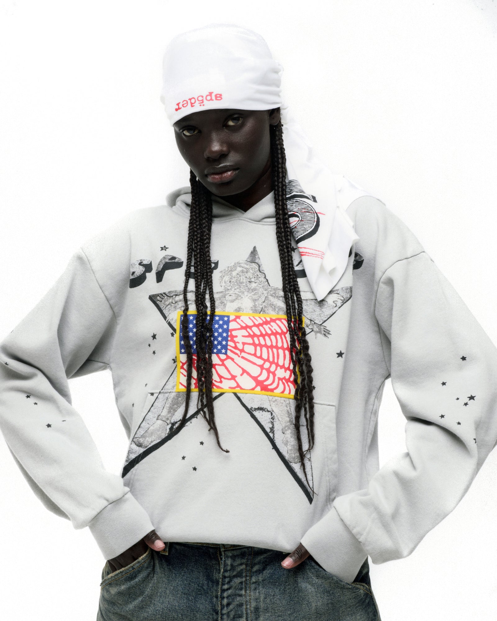 Light grey STAR GIRL HOODIE with large star graphic, American flag, and scattered star prints.