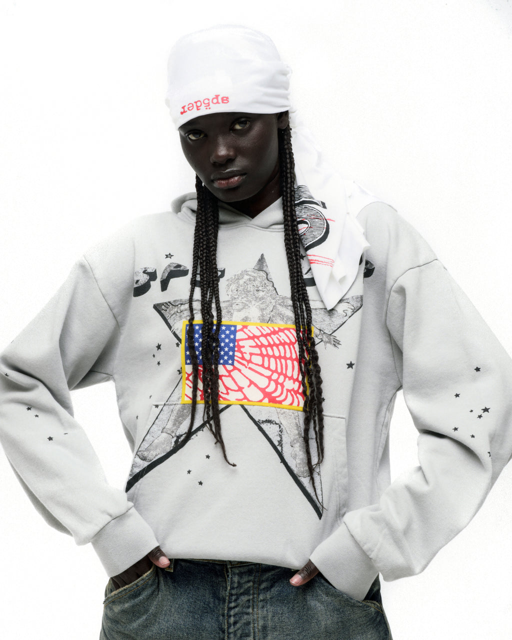 Light grey STAR GIRL HOODIE with large star graphic, American flag, and scattered star prints.