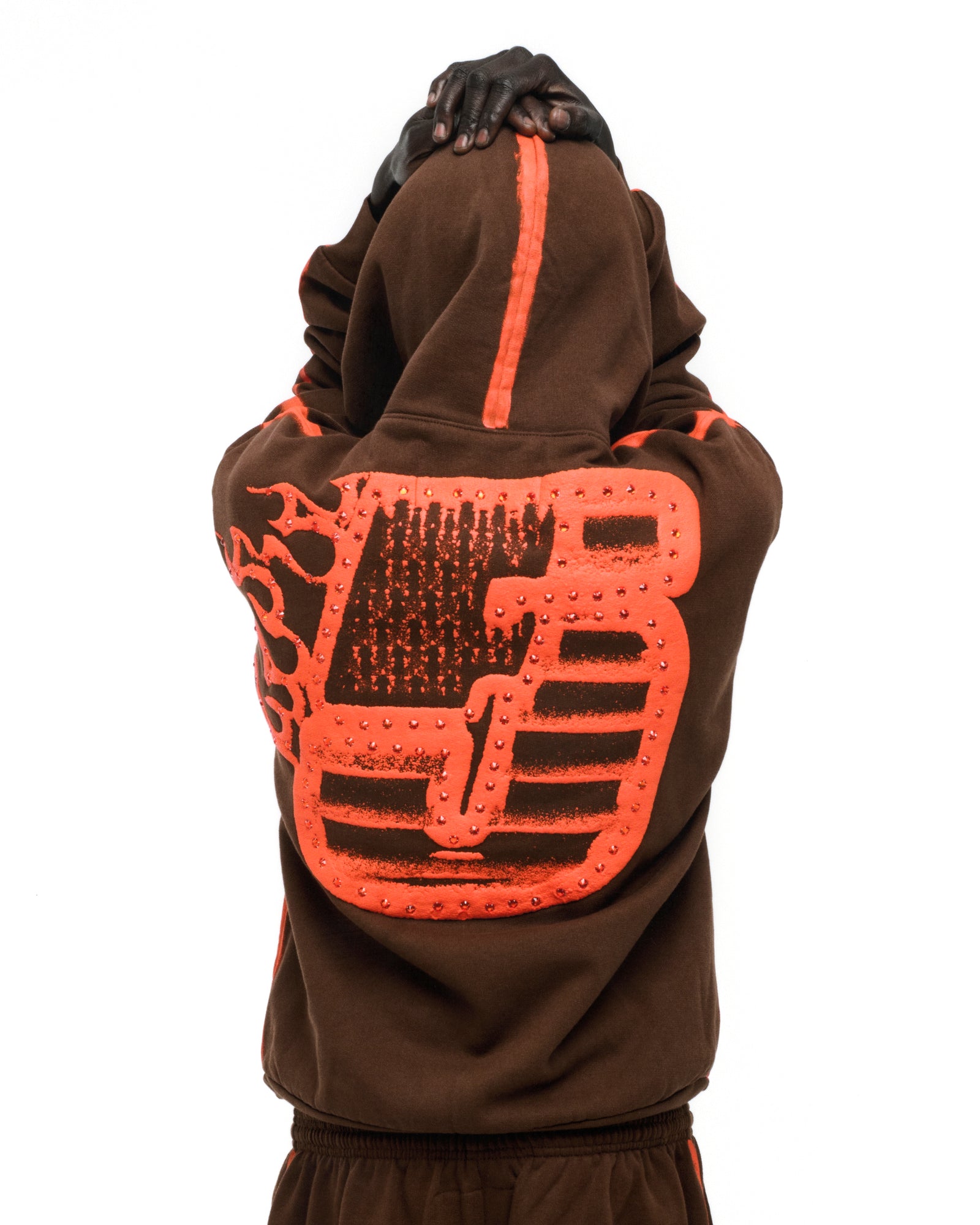 Brown fleece hoodie with orange "5" and rhinestone accents on back, sprayed stripe on hood and sleeves.