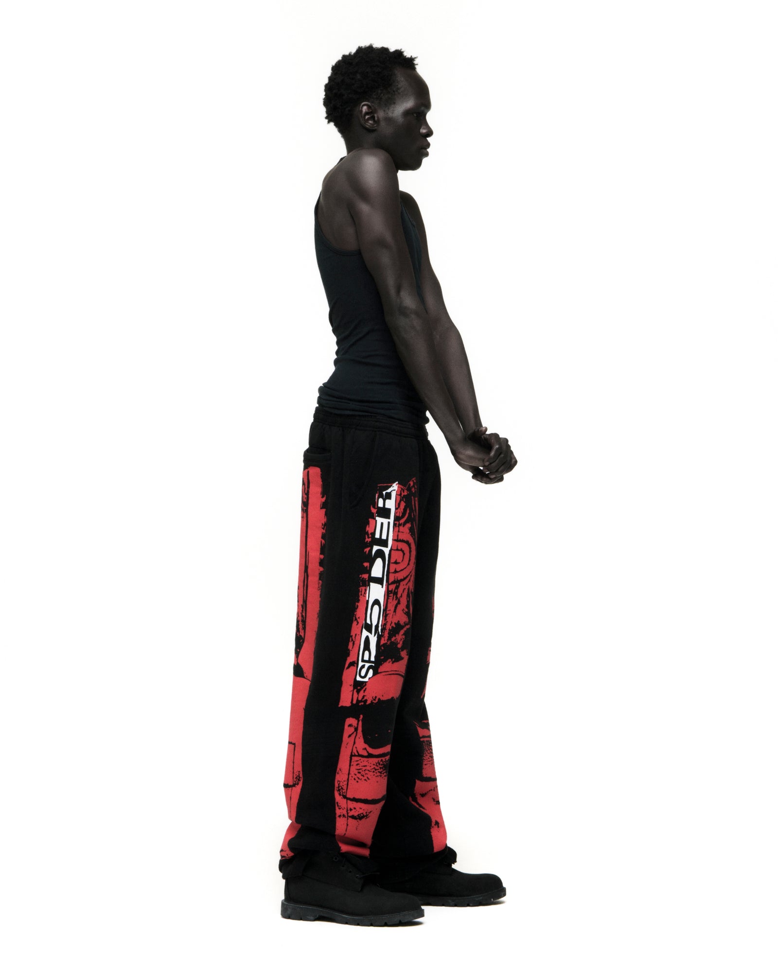 Black JP5 MOTO SWEATPANT with red painted moto design, wide-leg, 100% cotton fleece.