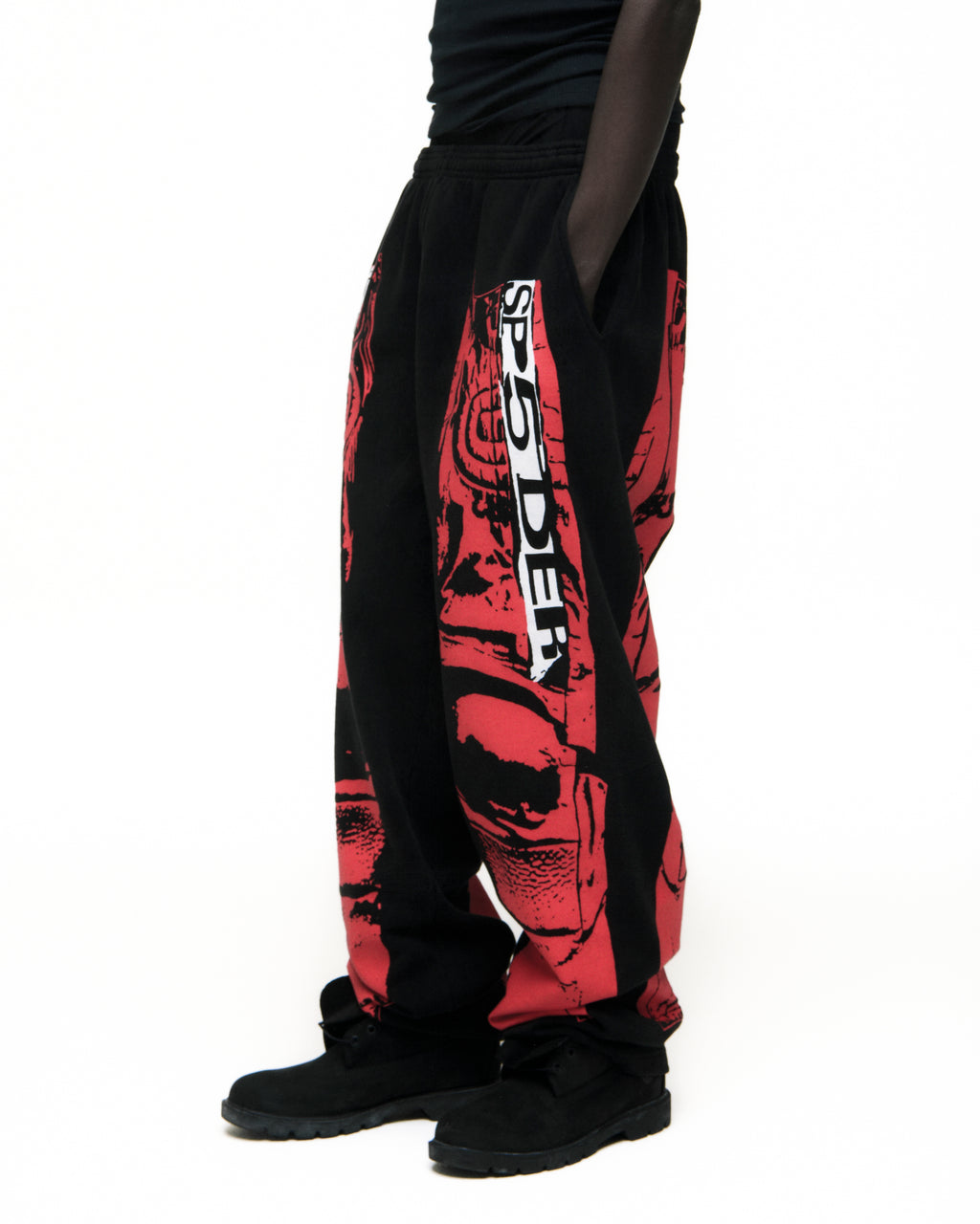 Black 13oz cotton fleece JP5 Moto Sweatpants with red painted moto design and "SP5DER" text.