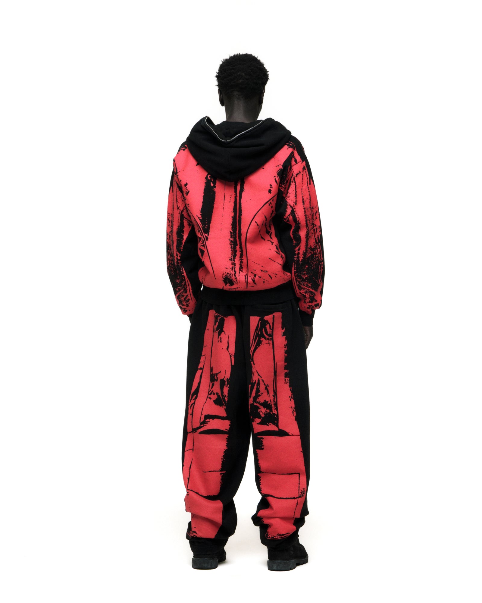 Black and red JP5 Moto Hoodie and sweatpants with painted design, full zipper, and kangaroo pocket.