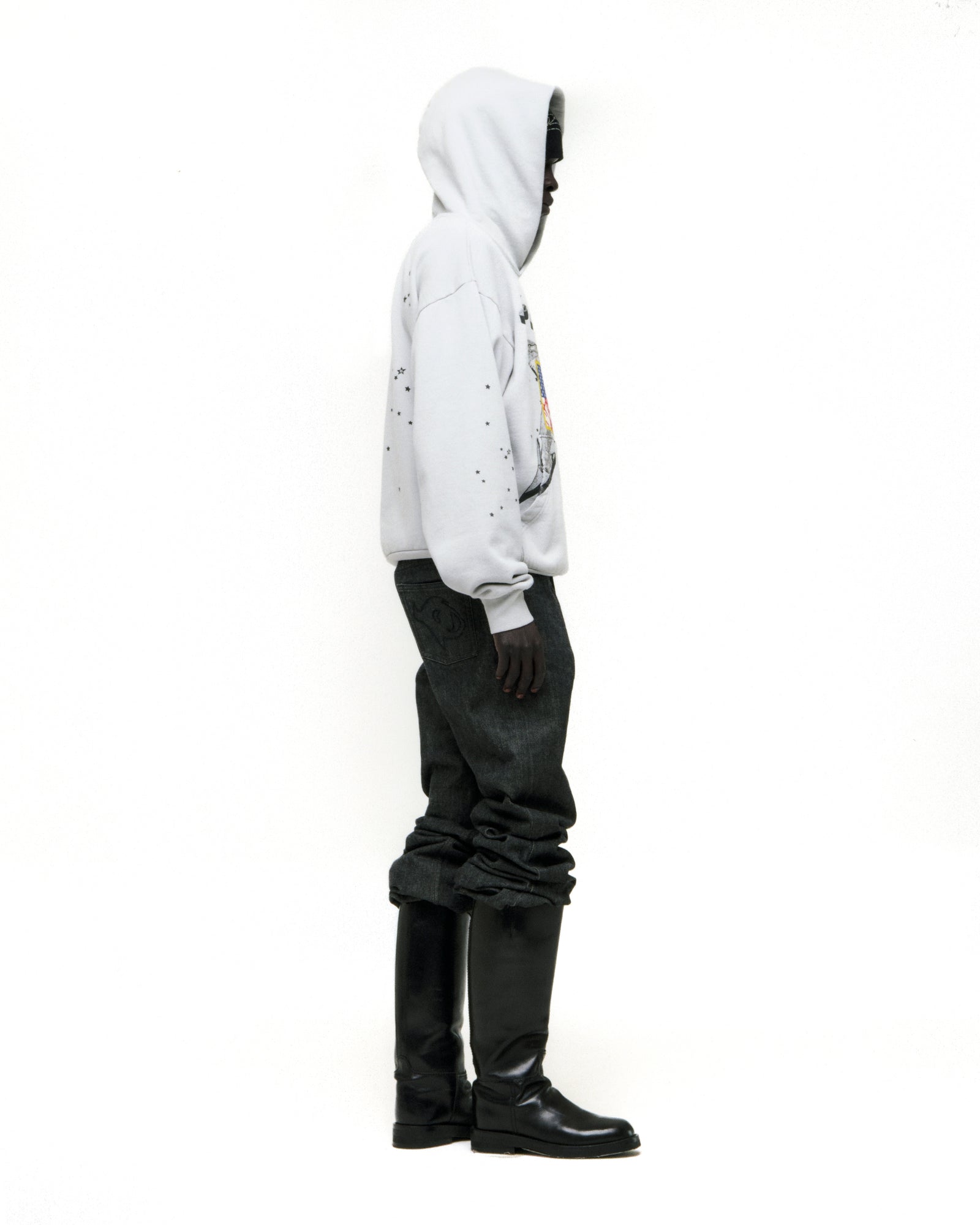 White 100% cotton fleece STAR GIRL HOODIE with graphic print, scattered stars, and kangaroo pocket.