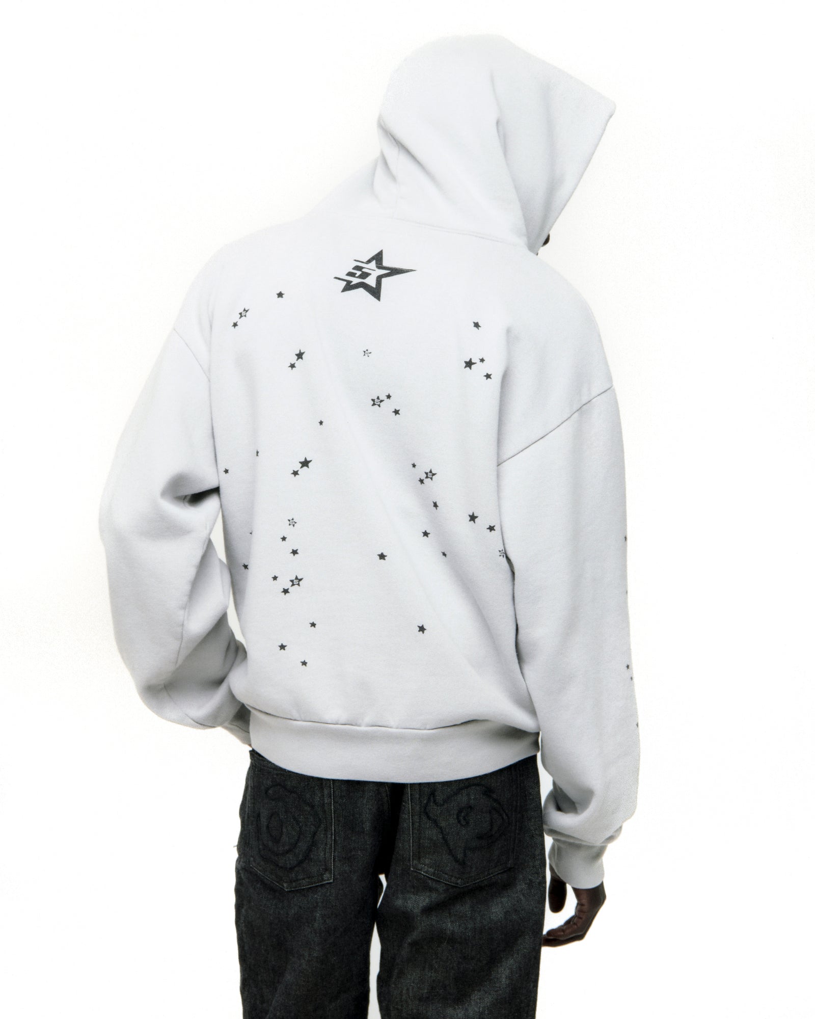 White 100% cotton fleece STAR GIRL HOODIE with scattered star print and '5' star logo on back.