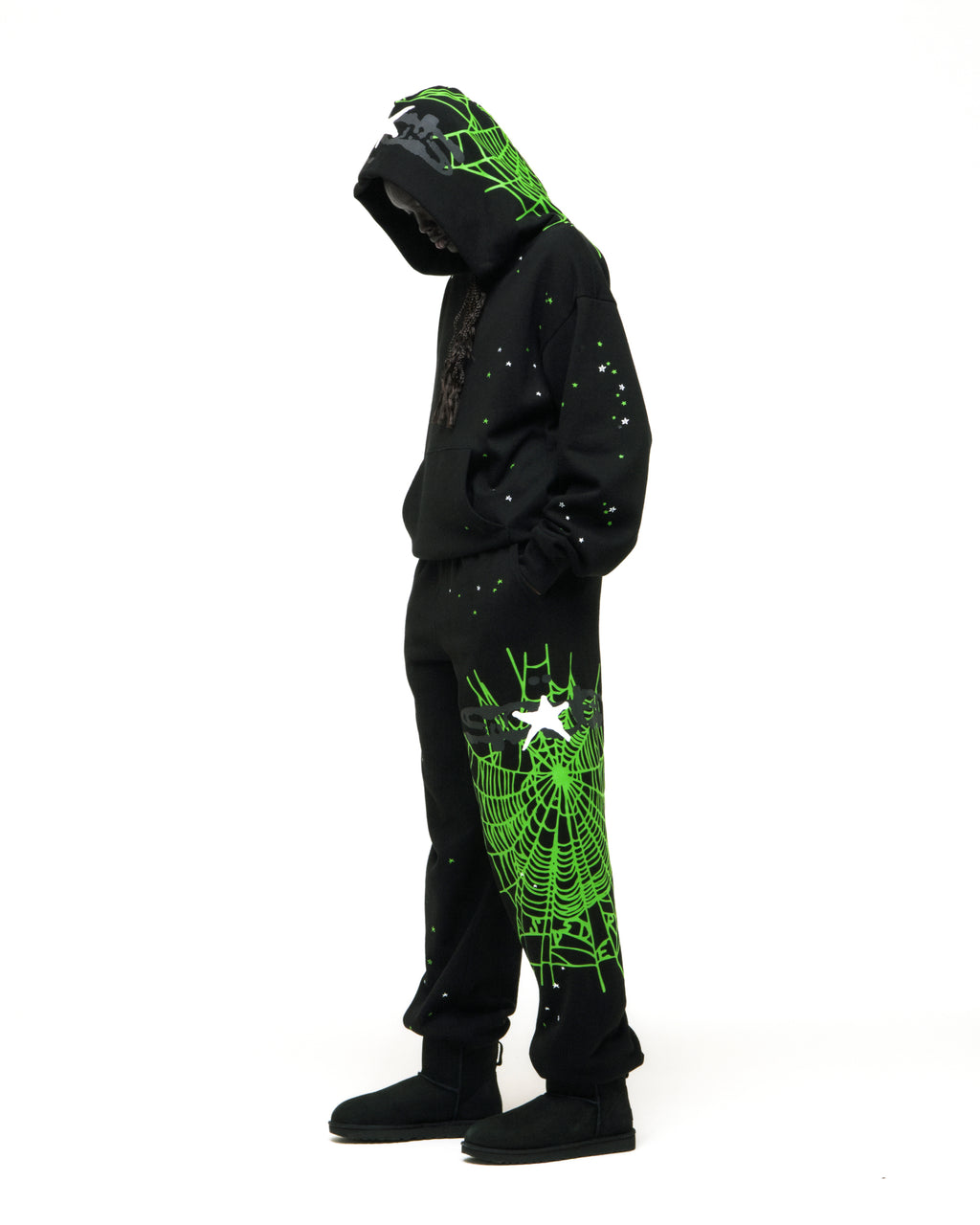 Black heavy web hoodie and sweatpants with green spiderweb and star prints.