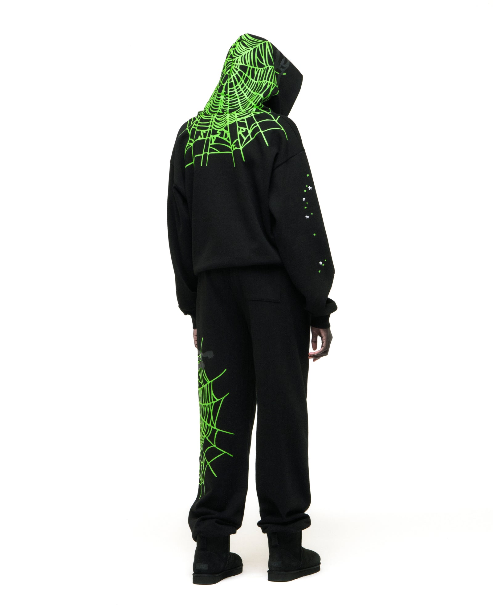 Black heavy web hoodie and sweatpants with neon green spiderweb and star prints.