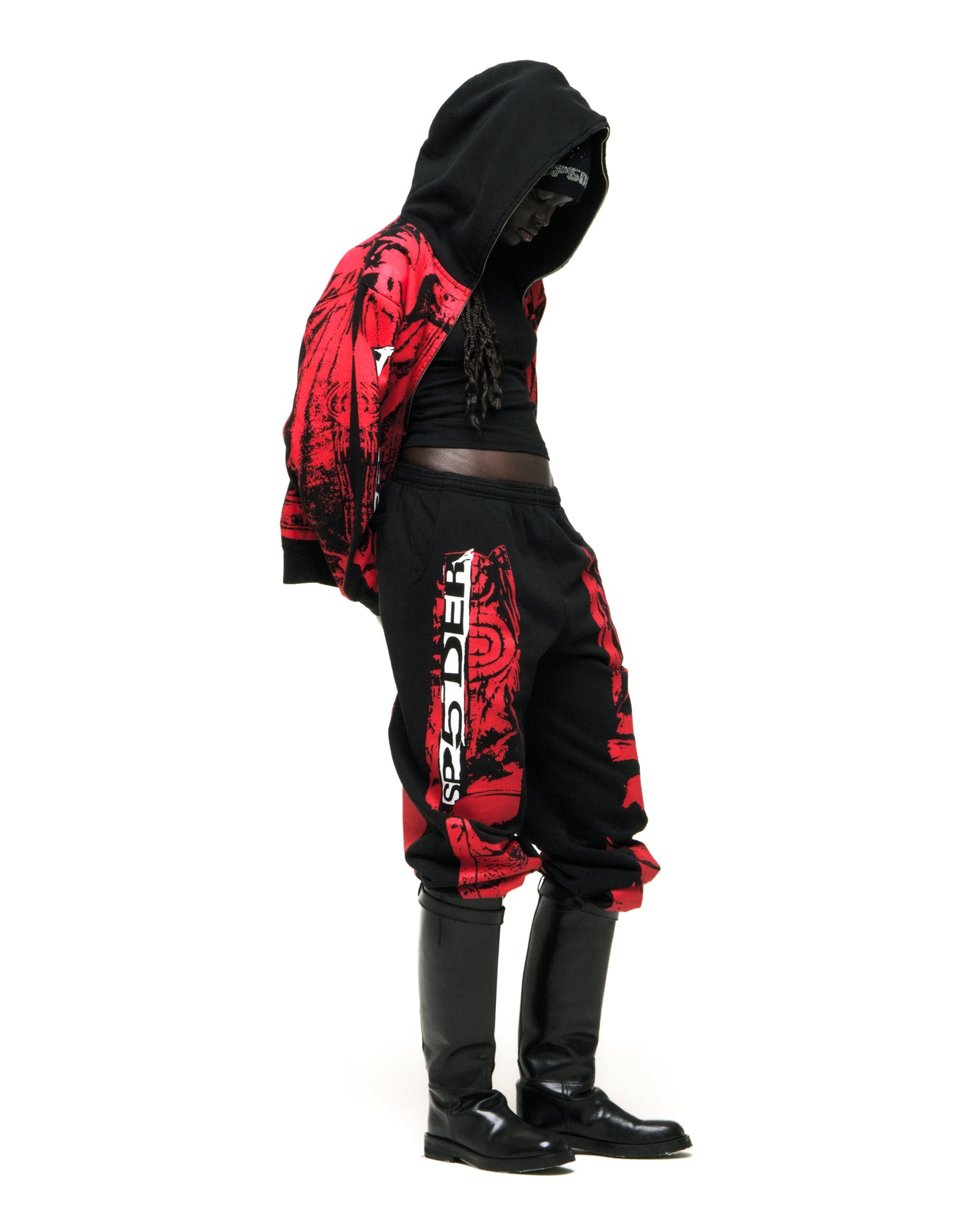 Black JP5 Moto Hoodie with red painted moto design, full zipper, and kangaroo pocket, worn with matching pants.