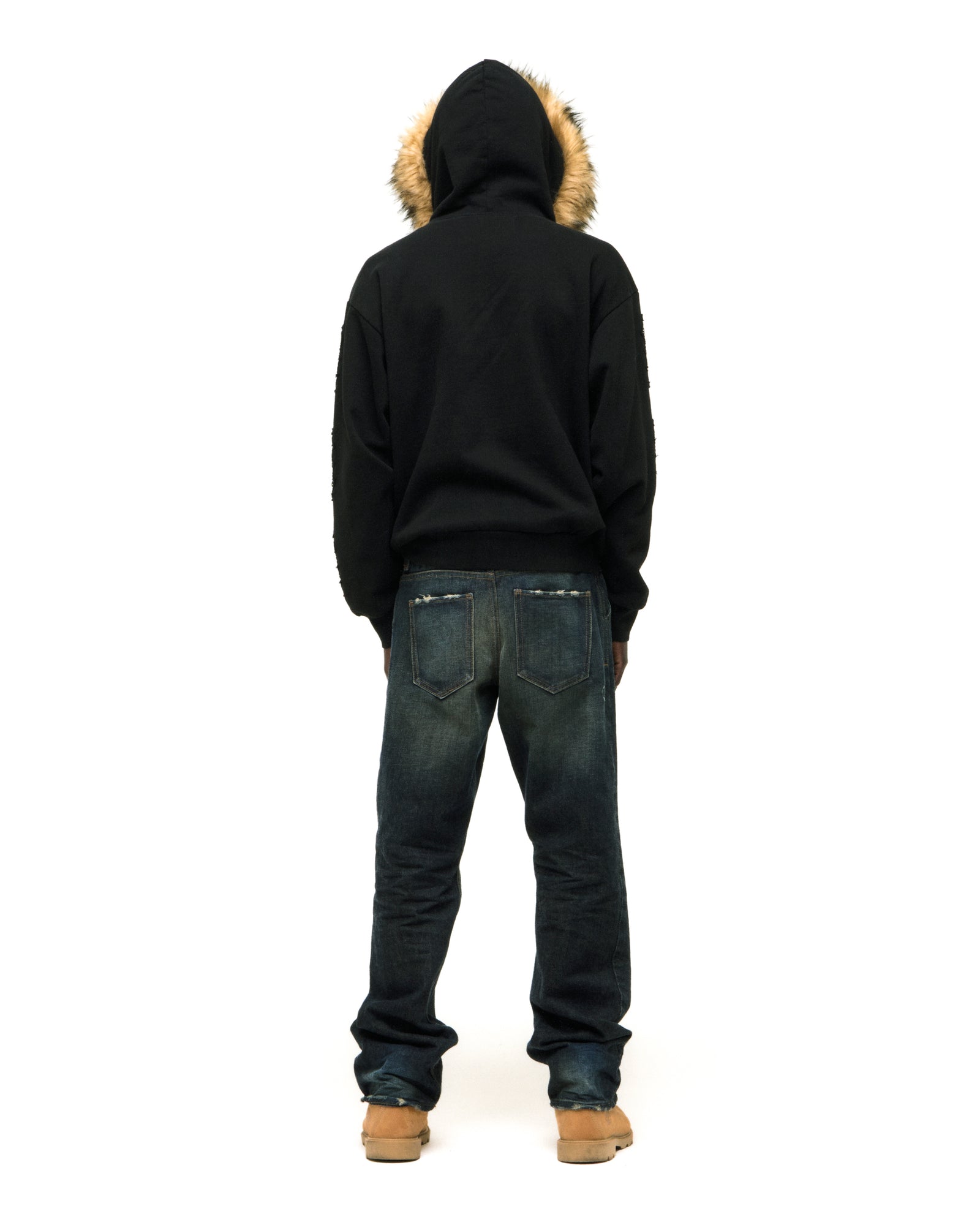 Black 13oz cotton fleece Garibaldi zip-up hoodie with faux fur hood trim and patterned sleeve accents.