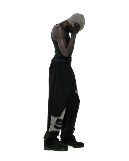 BLACK BIG STAR WIDE LEG SWEATPANT ON MODEL