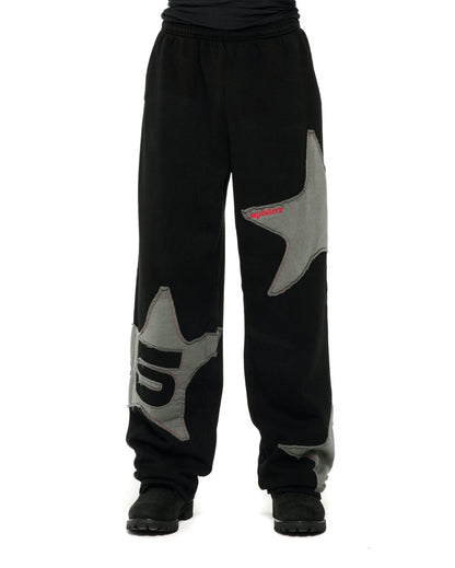 BLACK BIG STAR WIDE LEG SWEATPANT ON MODEL