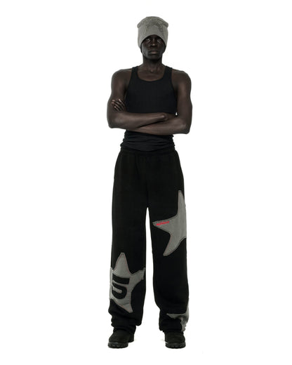 BLACK BIG STAR WIDE LEG SWEATPANT ON MODEL