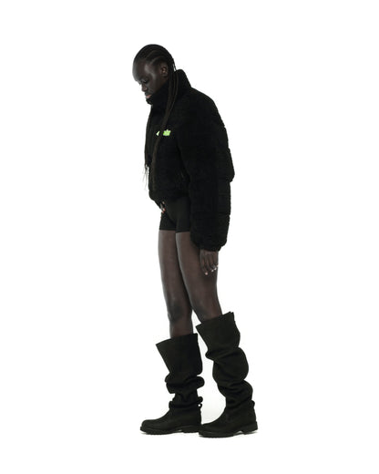 BLACK SHERPA PUFFER JACKET ON MODEL