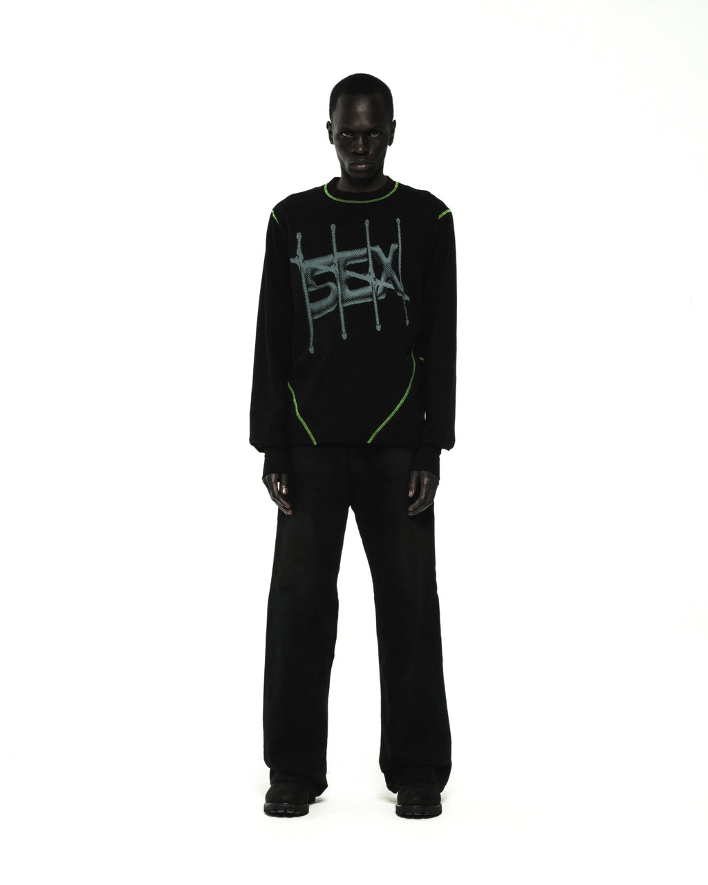 Black cotton SHADOWBANNED LONGSLEEVE with green contrast stitching and graphic print.