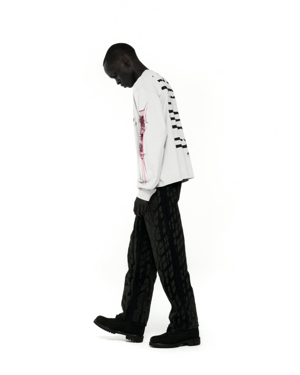 White 100% cotton WAIT LONGSLEEVE tee with graphic print on front, back, and sleeves.
