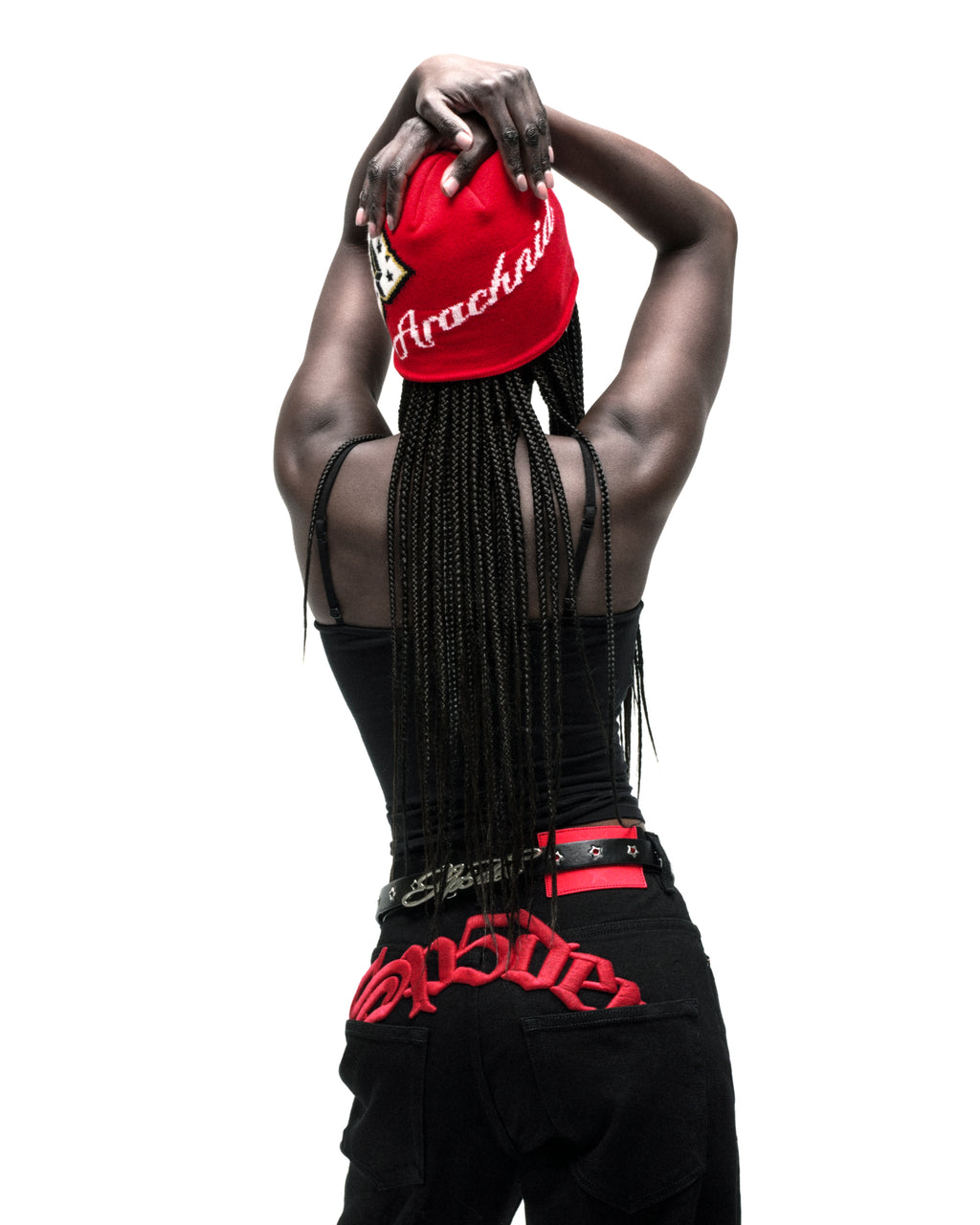Black leather R-05 Script Belt with cursive SP5DER buckle, studded star grommets, and silver tip.
