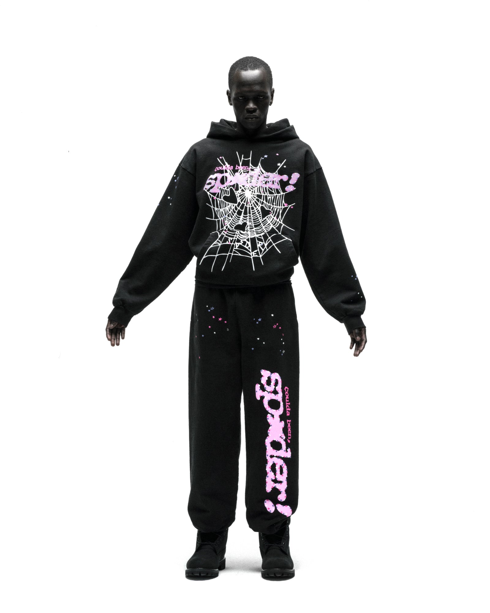 Black CB PUNK V2 Hoodie and sweatpants with white spider web and pink "SP5DER" puff print.