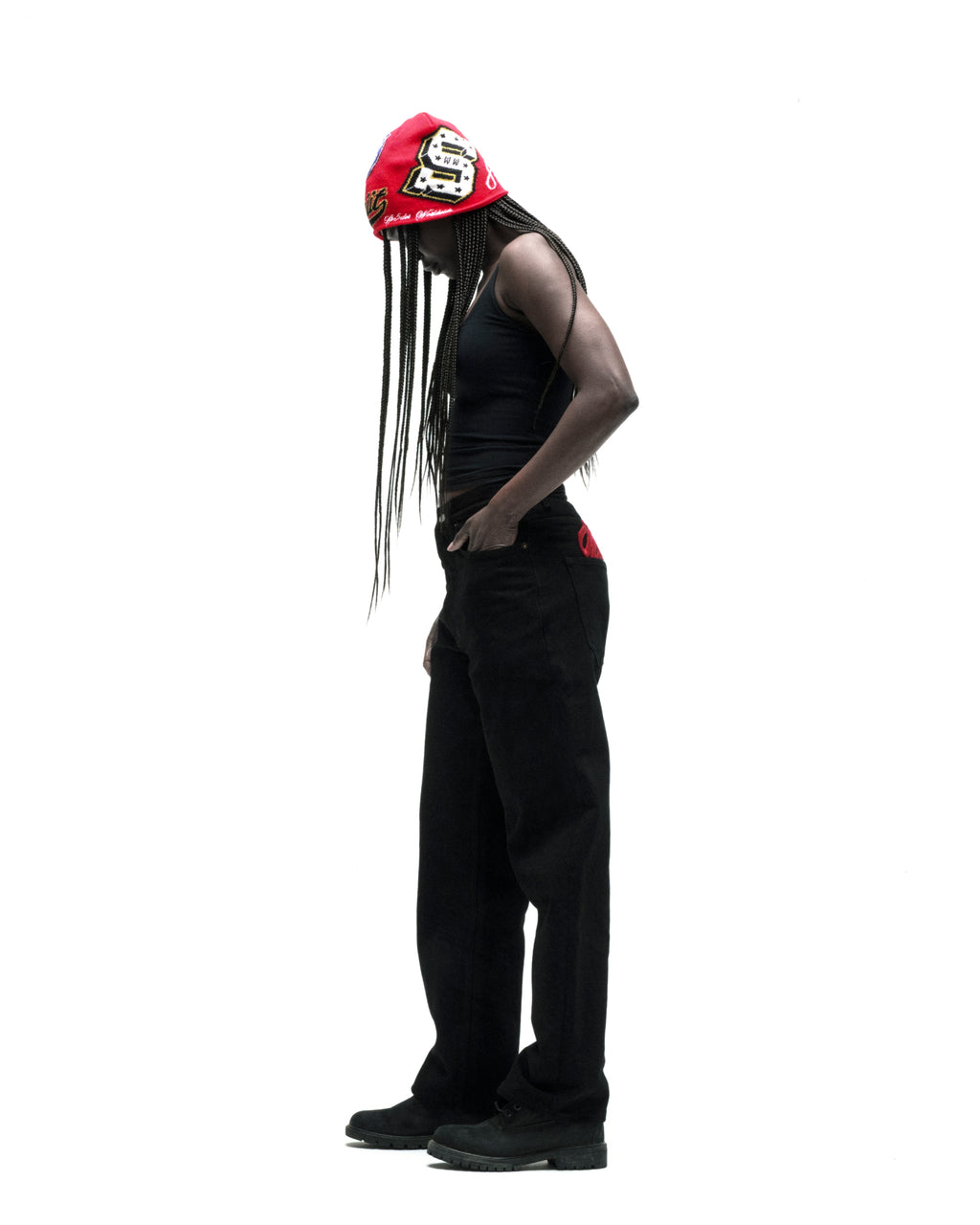 Black 13oz denim OXY JEAN with embroidered text, branded hardware, and leather back patch.