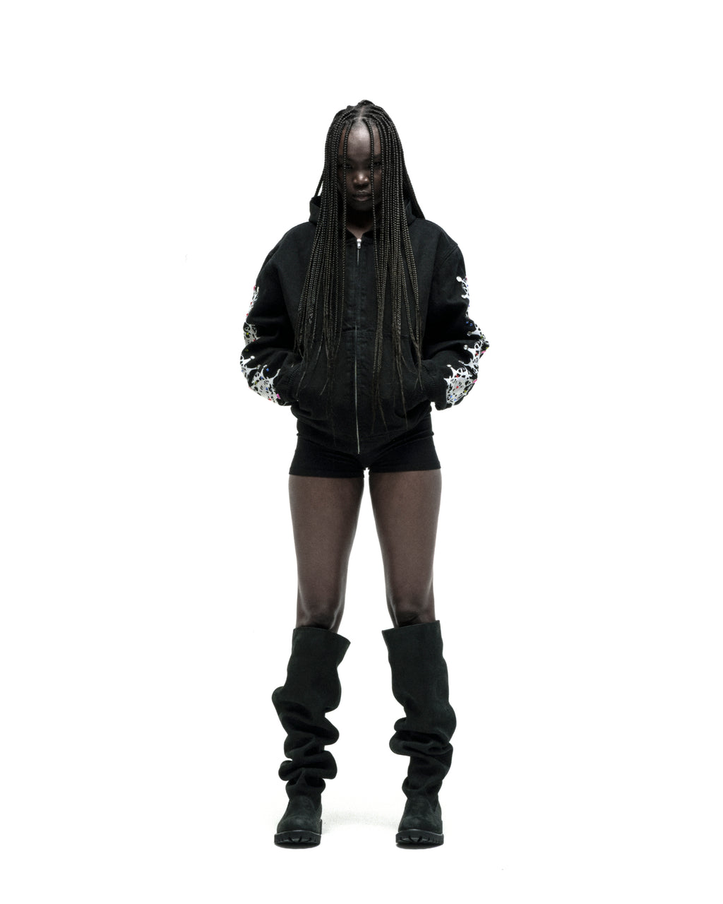 Black cotton canvas hooded jacket with faded wash, web print, and rhinestone sleeves.