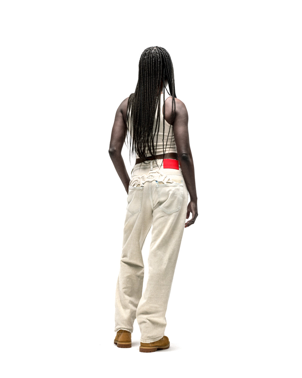 OXY JEAN 13oz cream denim pants with embroidered text above back pockets and red leather patch.