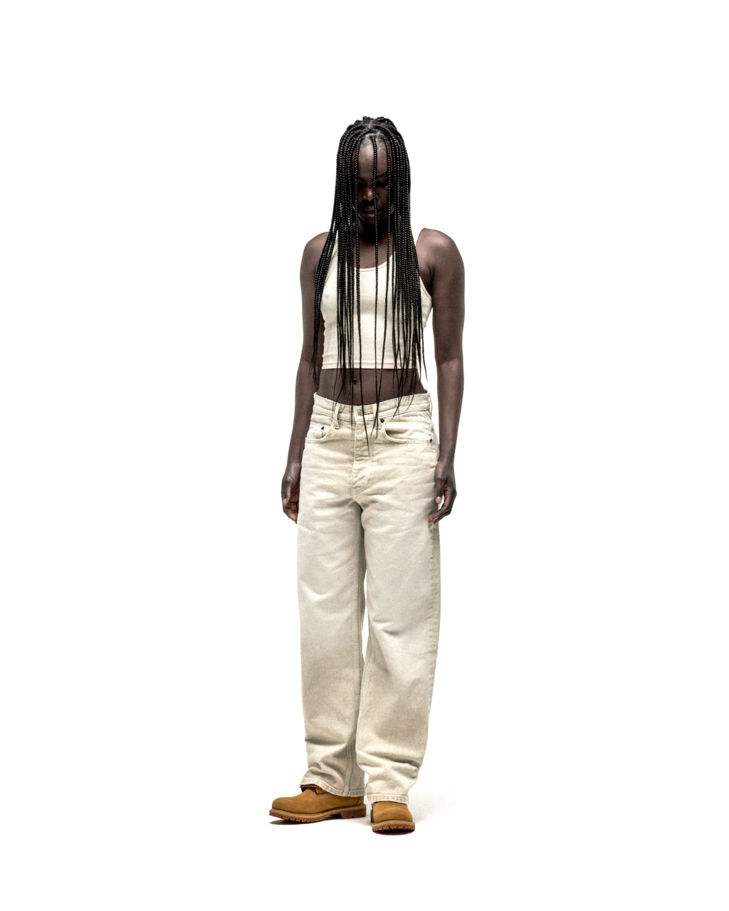 Model wearing OXY JEAN, 13oz light wash denim with straight leg fit and custom hardware.