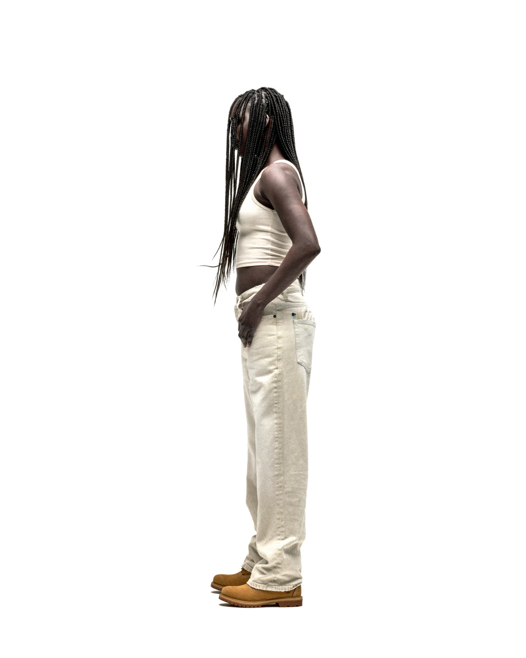OXY JEAN: Light wash 13oz denim pants with straight leg fit, worn by a person in profile.