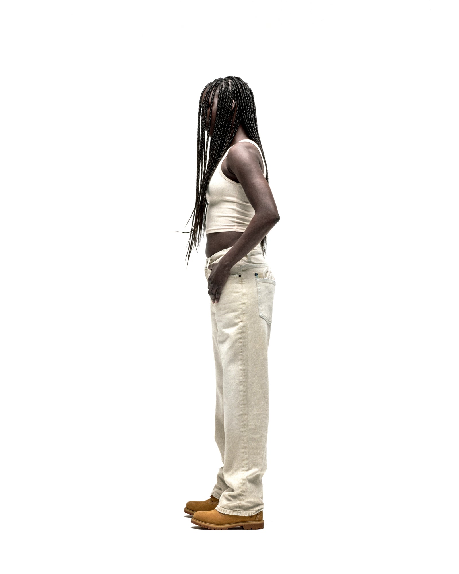 OXY JEAN: Light wash 13oz denim pants with straight leg fit, worn by a person in profile.