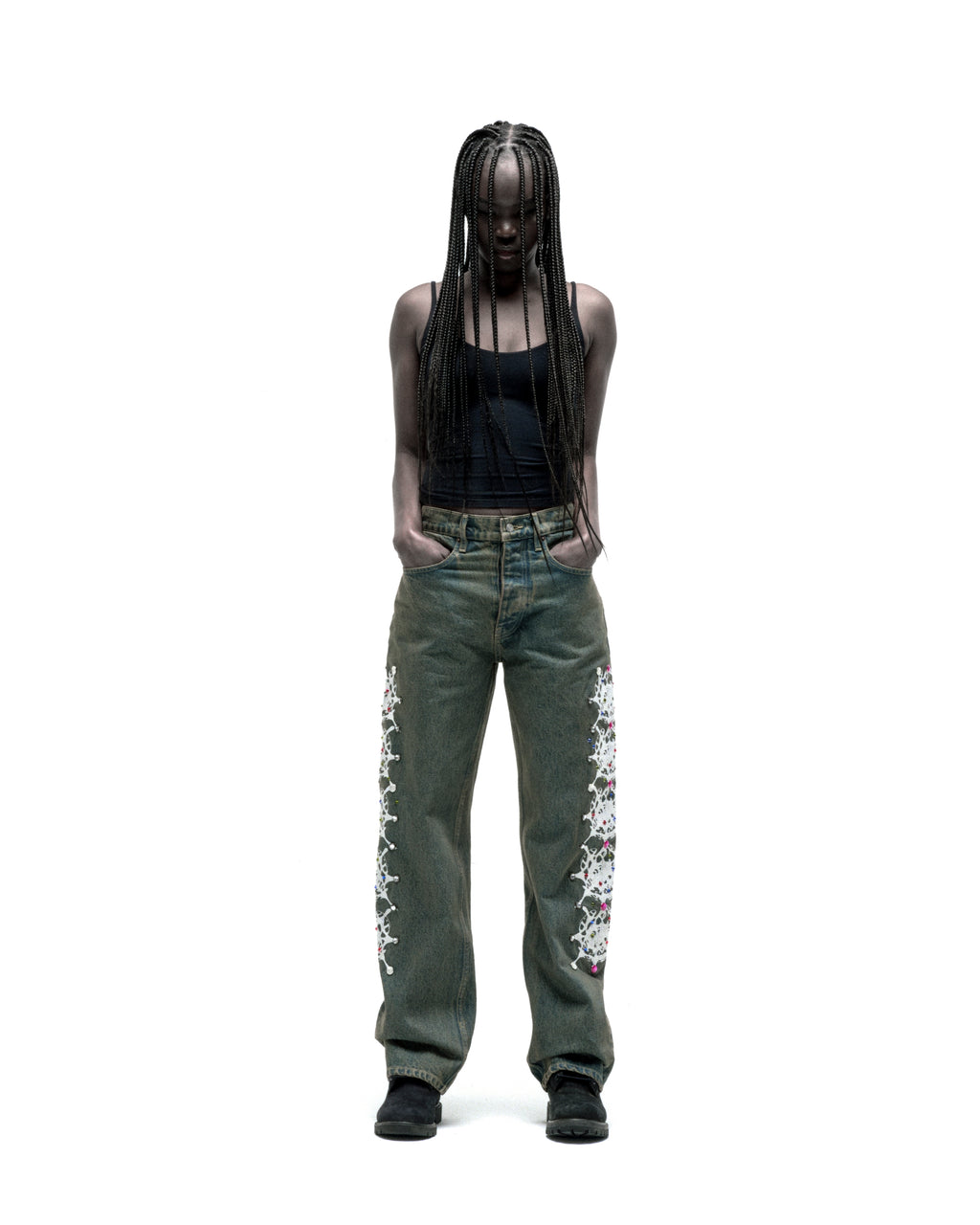 WEBSTONE DENIM vintage wash 13oz denim pants with white web print and rhinestone embellishments.